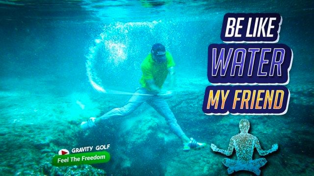Golfer practicing mindfulness by focusing on a leaf on the course